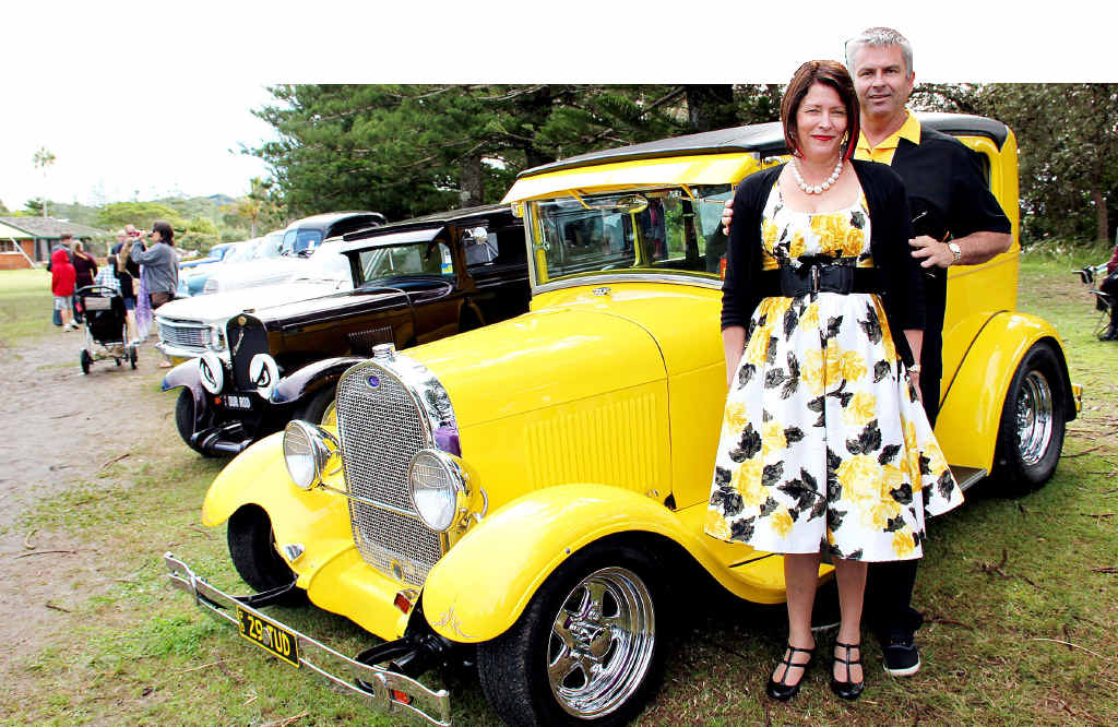 BRING A LITTLE SUNSHINE: Enthusiasts Michelle and Mark Heywood with their 1929 Ford Tudor. BRING A LITTLE SUNSHINE: Enthusiasts Michelle and Mark Heywood with their 1929 Ford Tudor.